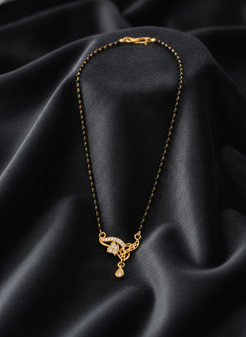 ELURA Designer Black Bead Mangalsutra with CZ Leaf Pendant